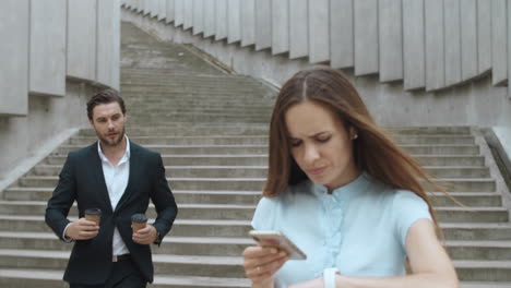 businessman meeting colleague outdoors