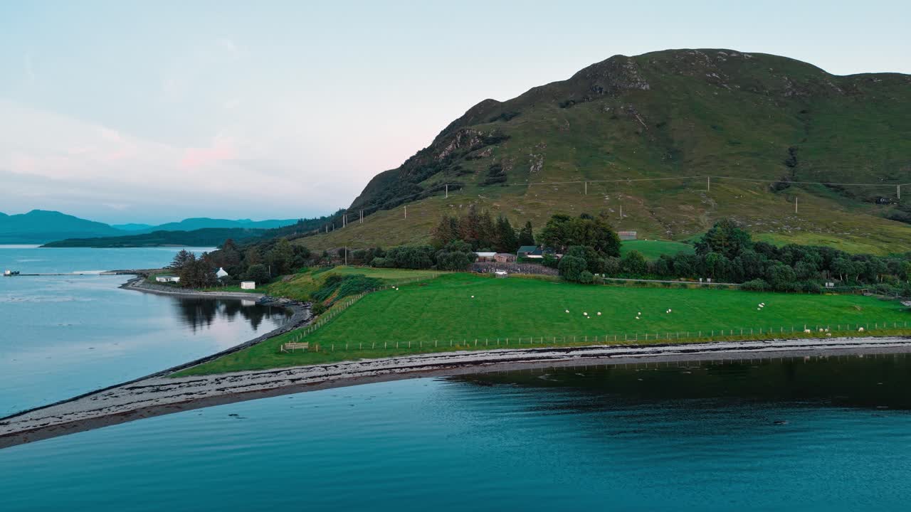 Scenic landscape with mountain, water, and green fields