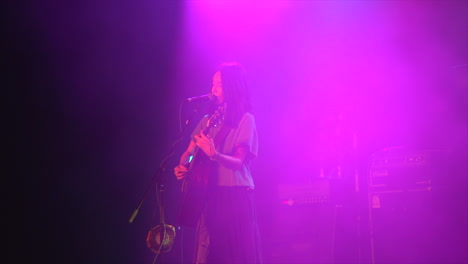 live music performance by female artist on stage