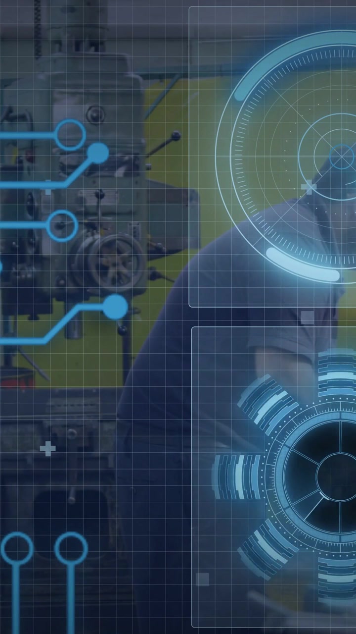 Vertical video: Operator reaching panel in manufacturing shop, hand driving HUD dials aiding tuning