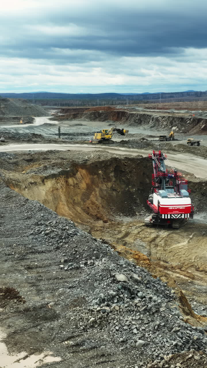 Large-Scale Open-Pit Mining Operation with Heavy Machinery