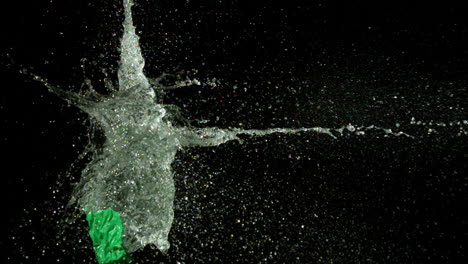 Arrow-shooting-through-water-balloon