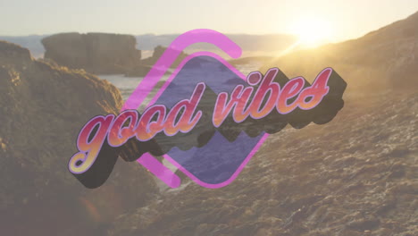 animation of the words good vibes in orange and purple letters over rocky coast and sea at sunset