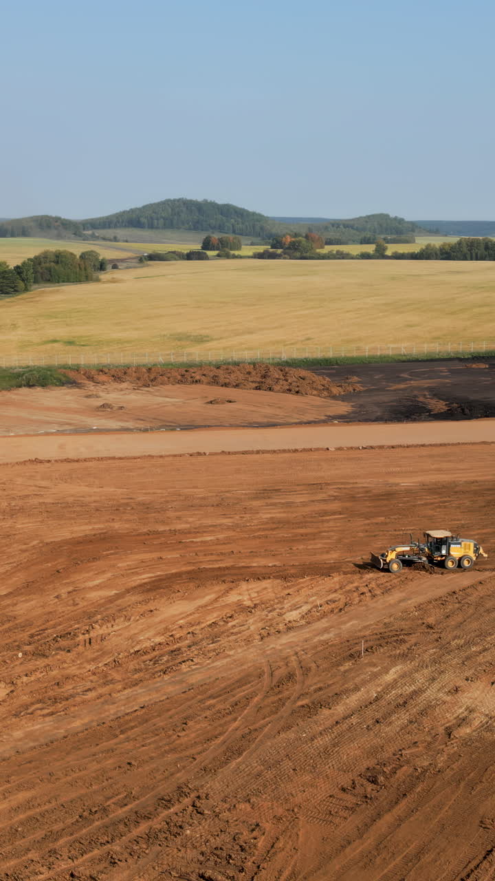 Construction site with heavy equipment preparing land