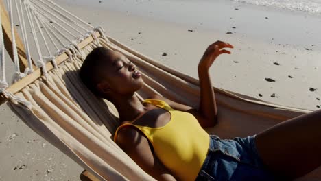 young woman by the sea