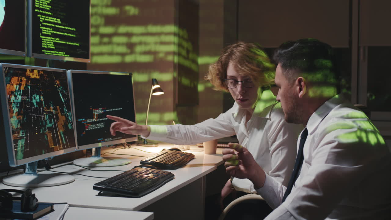 Co-workers Staying Late In Office