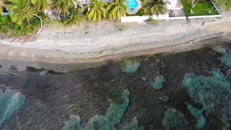 drone shot hovering over the beach in a southern beach in puerto rico