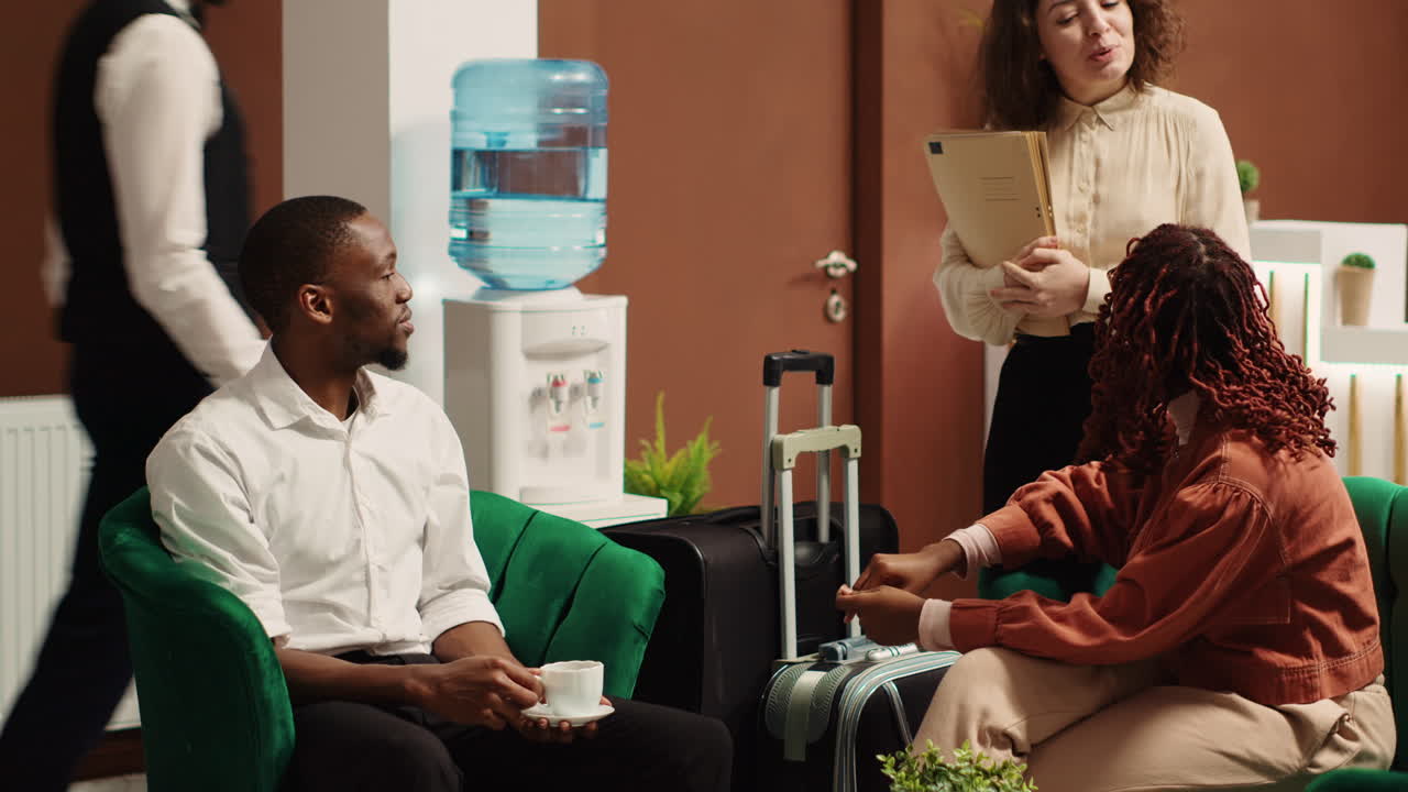 Travellers enjoying coffee in hotel