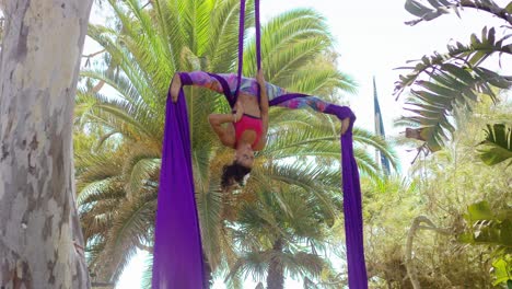 Agile-young-gymnast-working-out-on-ribbons