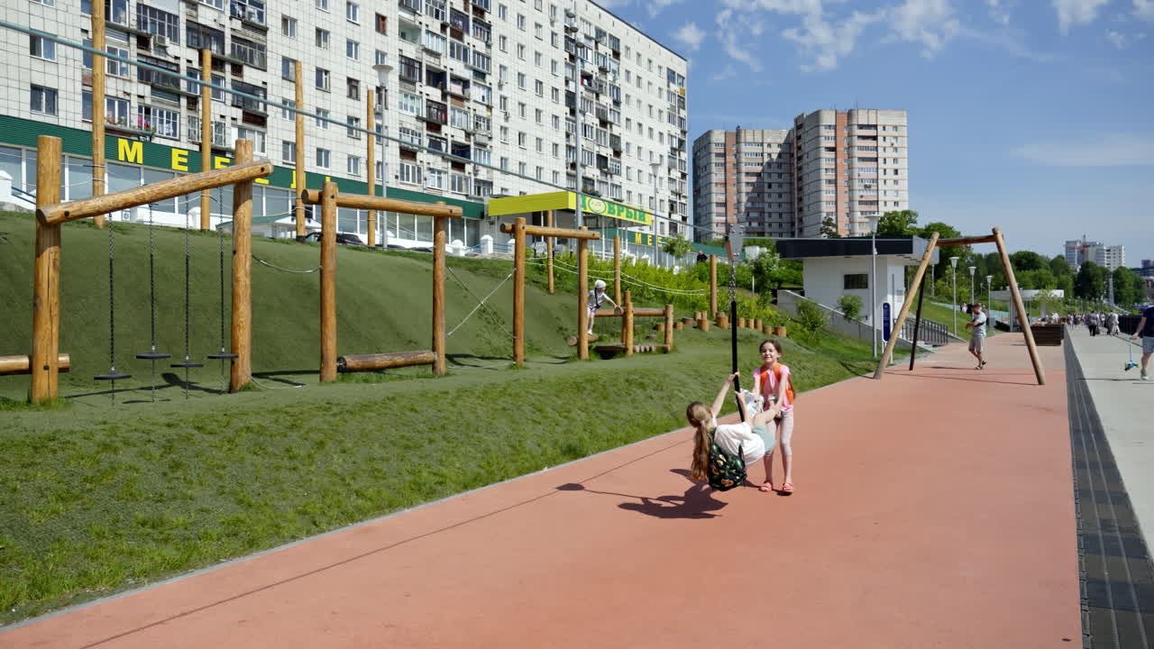 Children Playing on a City Playground