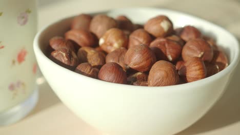 hazelnuts in a white bowl