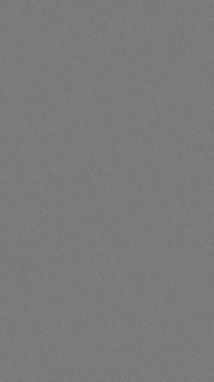 Pystyformaatin aito 35 mm:n filmirae-tekstuuri hienovaraisella kohinalla retro- tai elokuvamaisen ilmeen luomiseksi, saumaton silmukka.