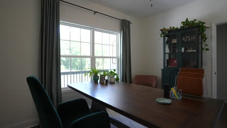 cinematic slider shot of home office desk and chair, work from home concept, entrepreneur