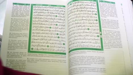 indonesia august 7 2020 : muslims reading quran inside masjid, al matsurat