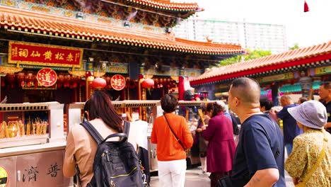 people engaging in rituals at a temple