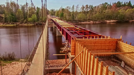 time lapse of a bridge being constructed over the gauja river in latvia