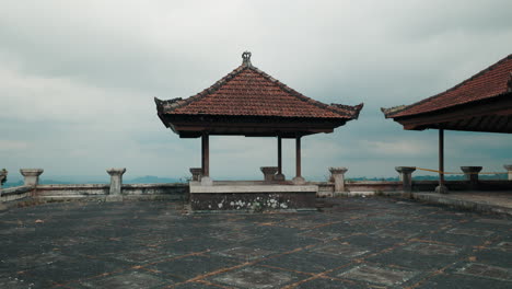 traditional balinese style gazebos on an overcast day