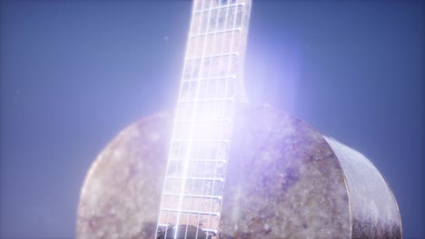 guitarra clásica sobre un fondo azul