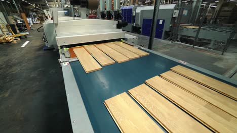 manufacturing lines for the manufacture of parquet full of value are operating in the woodworking plant. parquet production technology