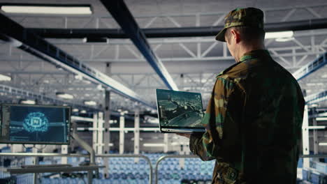 military data center expert using ballistic missiles radar on laptop