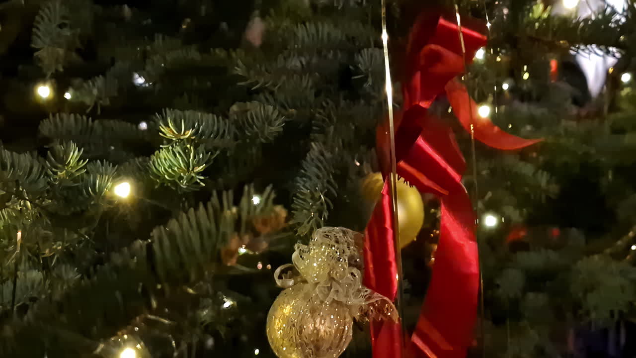 Sparkling ornaments and festive details on a decorated Christmas tree. Jelgava, Latvia