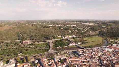 aerial wide fly-over algarve castle of silves from arade river outskirts