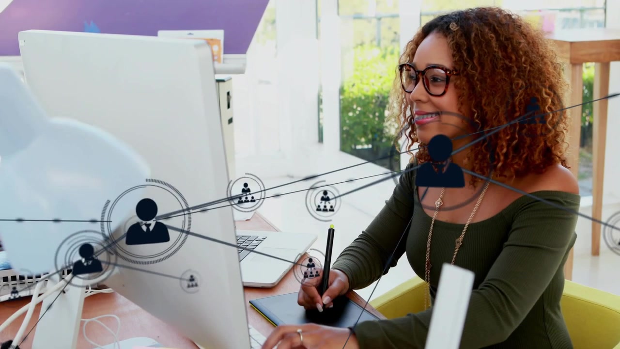 Animated network icons appearing, woman drawing on tablet with stylus at home, monitor, copy space
