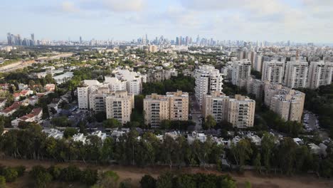 Reversing-reveal-from-high-density-residential-area-to-large-recreational-park