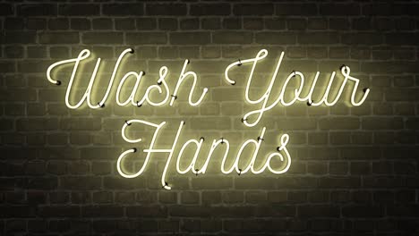 bright yellow/white neon sign that says the words wash your hands on a dark brick background, the sign have multiple flashing options and can also be seamlessly looped.