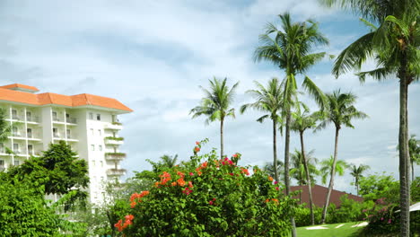 Tropical-flowers,-palm-trees-at-Shangri-la-resort,-Cebu,-Philippines