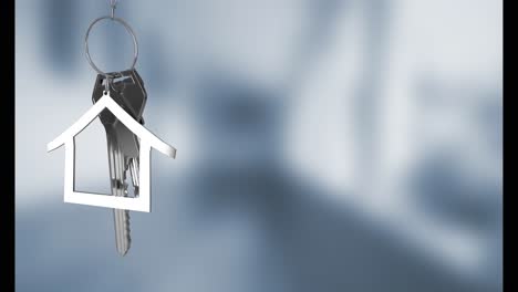 Animation-of-keys-with-house-keychain-over-blurred-background