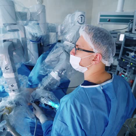 medical surgical robot doing surgery. modern medical equipment. specialist performs an operation with minimally invasive robotic surgery system.