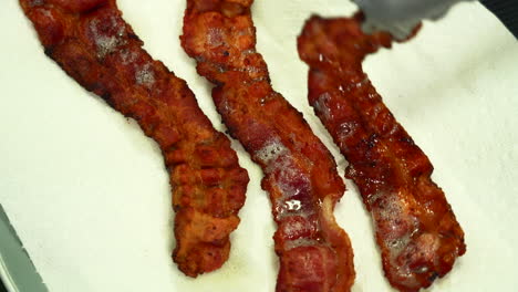 shot of crispy bacon just after being fried