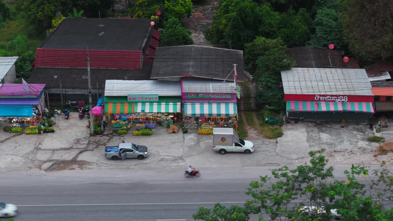 Aerial view of a bustling street market in Southeast Asia