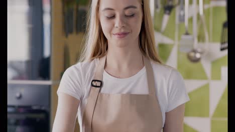 woman preparing a salad in a kitchen