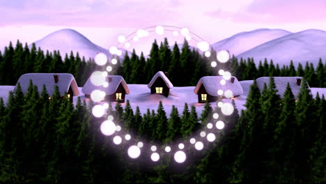 decorative fairy lights against winter landscape with house and trees