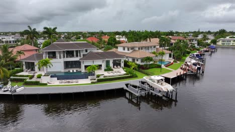 aerial approaching shot of private villa in naples on venetian islands