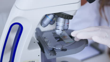 scientist hands, microscope