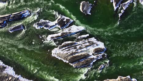 liard river fast flowing in winter in canada, long aerial drone shot