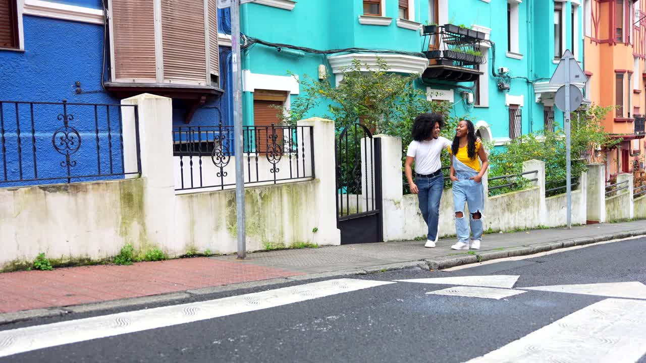 Couple Enjoying a Walk in a Colorful City
