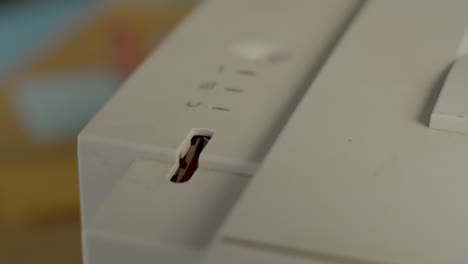 An Error Light Flashes on an Old 90's Printer then stops, Static Close Up