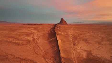 ship rock landform with sharp peaks in new mexico - aerial drone shot