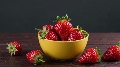 strawberries in a yellow bowl