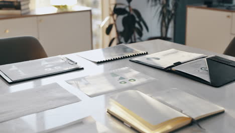 business documents and notebook on a desk in the office