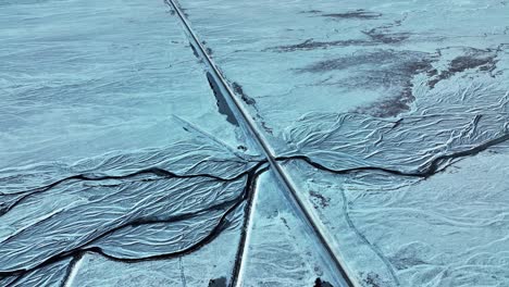 route 1, popularly known as ring road, through icy landscape in south iceland at winter