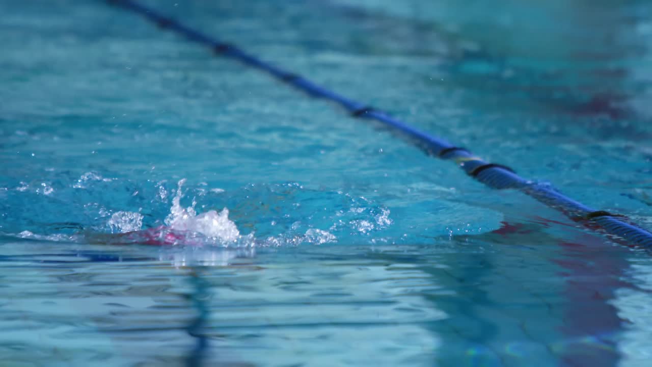 Swimmer training in a swimming pool