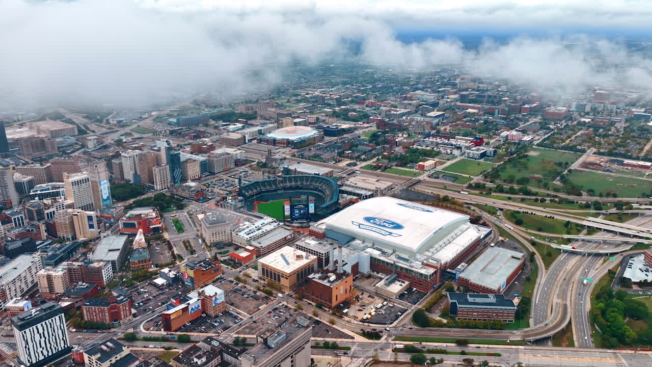 Detroit, USA, 28 July 2025: Approaching the clouds covering the sky over Detroit, Michigan, USA. Drone footage over the city downtown at daytime