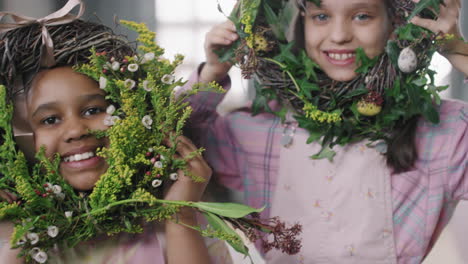 cute girls posing with flower wreaths