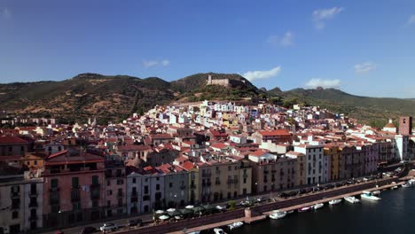 aerial panorama of picturesque italian town bosa with colored house, sardinia