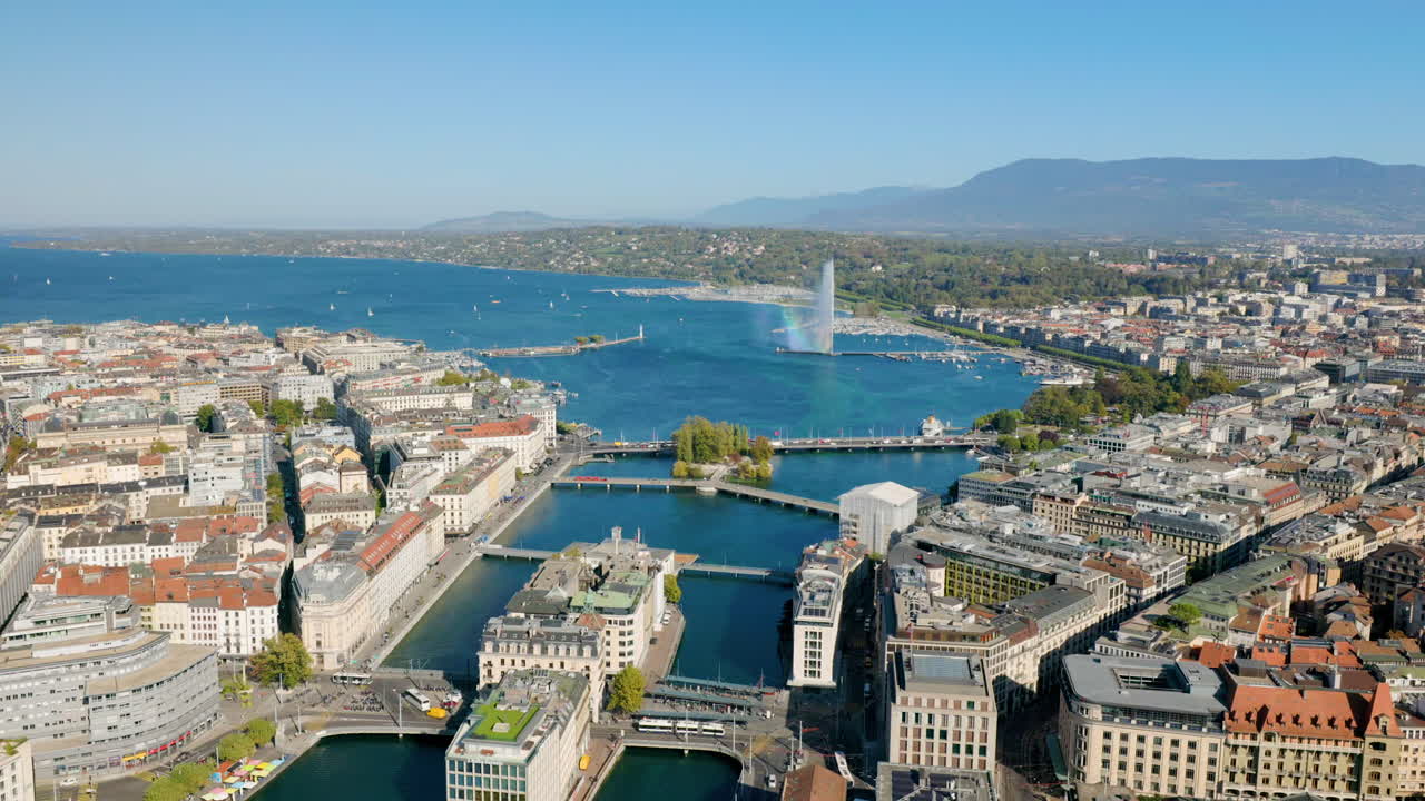 스위스 레만 호수 를 내려다보는 로네 강 을 가로질러 있는 제네바 의 도시 풍경